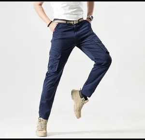 Detailed view of men's navy blue multi-pocket cargo pants with outdoor hiking style