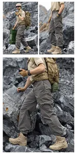 Detail view of men's loose tactical cargo pants with multi-pockets in outdoor setting