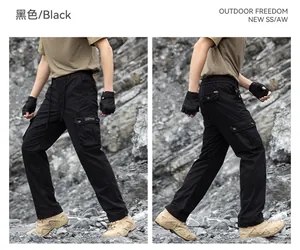 Detailed view of men's black tactical cargo pants with functional multi-pocket design