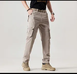 Detailed view of men's vintage multi-pocket cargo pants in khaki outdoor style.