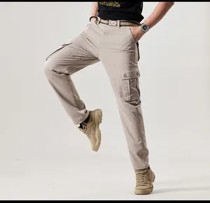 High-quality detail view of retro khaki multi-pocket cargo pants for men in outdoor style