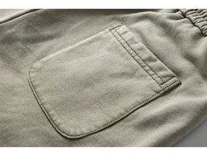 Detail shot of the rear pocket with reinforced stitching on men's cargo shorts