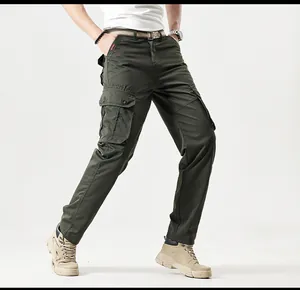 Model wearing dark green multi-pocket cargo pants for outdoor and casual mountain style