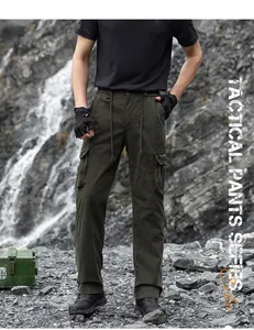 Detail of olive green tactical cargo pants with rugged multi-pocket functional design