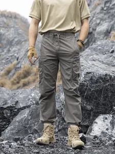 Men's functional techwear cargo pants with multiple pockets and drawstring waist