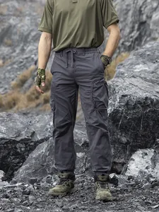 Men's loose Japanese functional style multi-pocket cargo pants in charcoal grey outdoor
