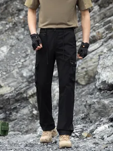 Men's black tactical cargo pants in functional Japanese style with multiple pockets
