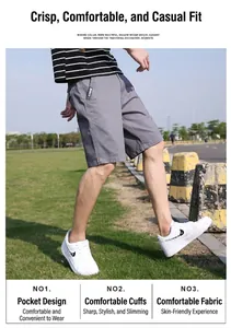 Detailansicht graue Herren Cargo-Shorts am Modell im Freien für den Sommer