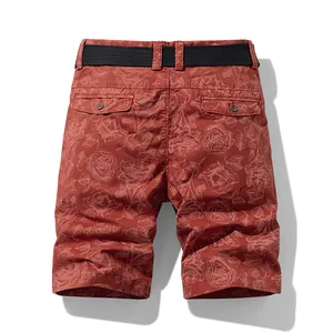 Men's summer red cargo shorts featuring a rose floral pattern and black woven belt