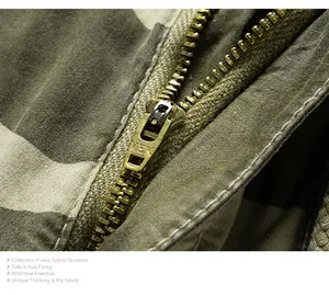 Detail shot of the durable metal zipper puller on vintage camouflage cargo shorts