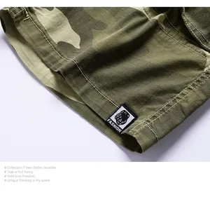 Close-up detail of vintage camouflage cargo shorts showing durable stitching and fabric texture