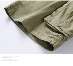 Close-up of the reinforced hem and stitching on men's vintage olive cargo shorts
