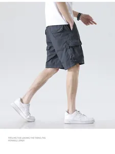 Side view of men's dark grey cargo shorts with multiple pockets, perfect for outdoor sports.