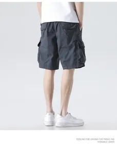 Back view of men's charcoal grey loose cargo shorts with multiple utility pockets