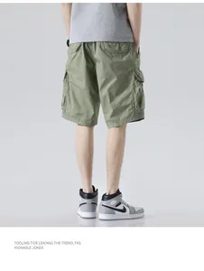 Detail back view of men's olive green cargo shorts featuring multi-pocket design
