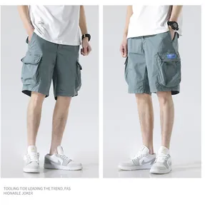 Front and side view of men's loose cargo shorts in grey-blue with large pockets