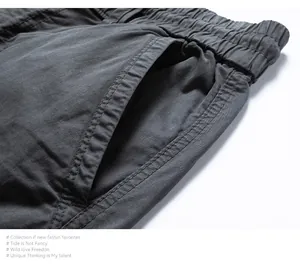 Close-up of men's retro cargo joggers showing pocket stitching and fabric texture