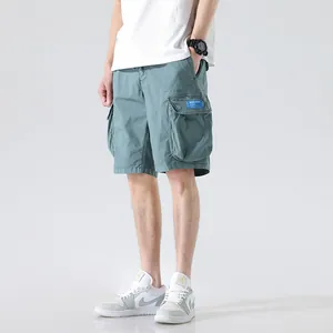Men's loose multi-pocket cargo shorts in mint green for summer casual outdoor wear