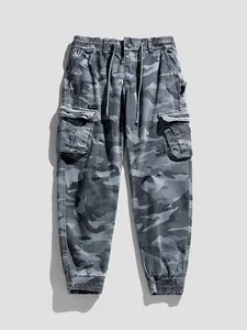 Men's American vintage camouflage cargo pants with elastic waist and drawstring detail.