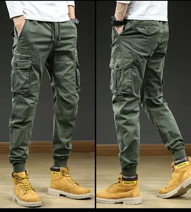 Men's olive green cargo jogger pants featuring multi-pockets and a vintage outdoor style.