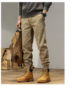 Full view of men's khaki cargo jogger pants with drawstring waist and elastic cuffs