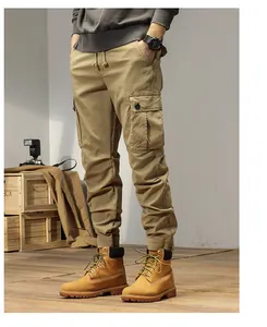 Side view detail of mens American vintage khaki cargo pants featuring large utility pockets