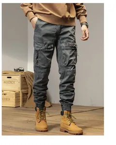 Detail of men's multi-pocket American retro cargo pants with elasticated cuffs