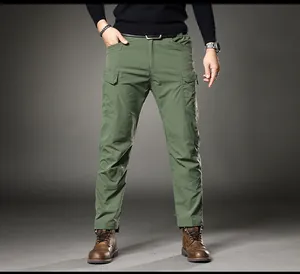 Full-length view of men's slim-fit straight cargo pants in army green casual style.