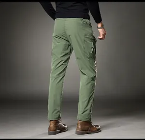 Detail rear view of men's slim fit army green cargo pants with straight leg cut and pockets.