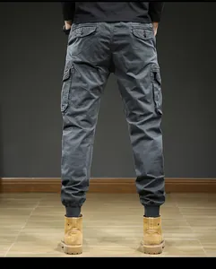 Detailed back view of men's retro grey cargo jogger pants with multiple pockets