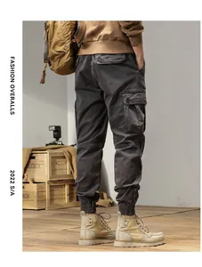 Back view of men's American retro dark gray cargo pants with functional pockets