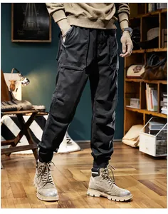 Stylish men's black cargo jogger pants with warm fleece lining in mountain style