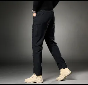 Side view of men's slim-fit black cargo pants with zipper pockets detail