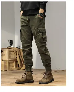 Front view of stylish men's vintage army green cargo pants with drawstring and elastic cuffs.