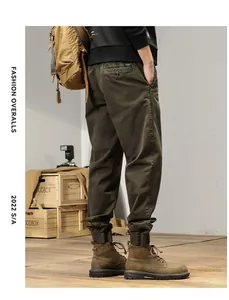 Detailed back view of men's retro olive cargo pants featuring elastic ankle cuffs