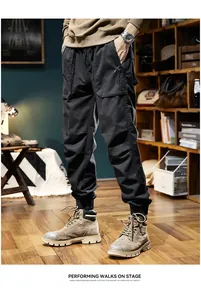 Stylish men's black winter fleece cargo pants featuring a retro loose jogger fit