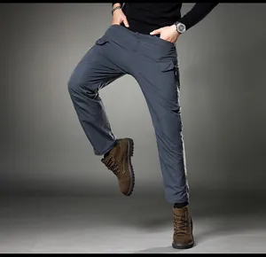 Detail view showing the slim fit and functional side pockets of men's cargo pants