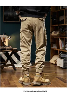 Detailed back view of men's vintage khaki cargo jogger pants with elastic cuffs
