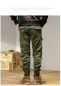 Back view detail of men's olive green cargo pants featuring elastic cuffs and multi-pockets.