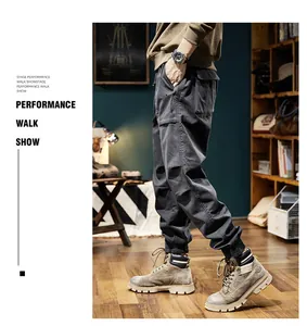 Side view of men's retro dark grey fleece-lined cargo jogger pants with elastic cuffs