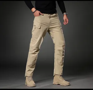 Detail of men's khaki slim-fit cargo pants showing fabric texture and pocket design