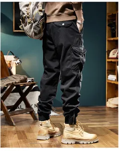 Back view of men's black retro jogger cargo pants with multi-pockets