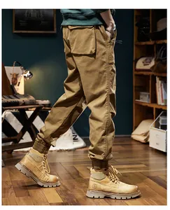 Detail view of men's vintage brown cargo pants with ribbed cuffs.