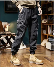 Detail shot of men's charcoal vintage jogger cargo pants with side pockets