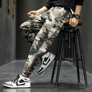 Men's camouflage cargo pants with multi-pocket design for outdoor street style