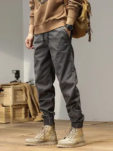 Men's retro elastic cargo pants in grey with a stylish outdoor mountain vibe, ideal for daily wear