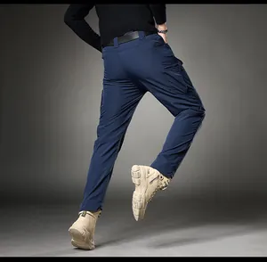 Detailed back view of men's navy blue slim fit cargo pants showing stretch fabric