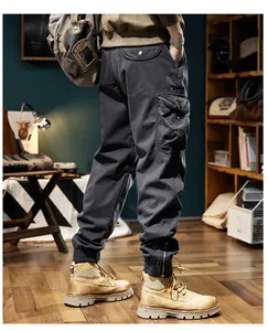 Detailed view of men's warm thermal cargo jogger pants in a vintage indoor scene