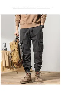 Detailed view of men's winter thick fleece jogger cargo pants with multiple pockets