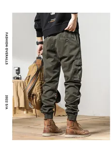 Back view of stylish army green cargo jogger pants featuring multi-pockets and cuffed ankles